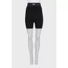 Black shorts with raised seams and tag