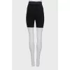 Black shorts with raised seams and tag