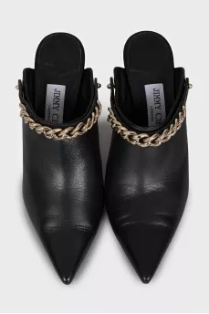 Black leather mules with gold trim