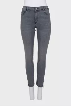 Gray jeans with a zipper on the leg