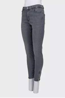 Gray jeans with a zipper on the leg