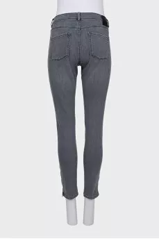 Gray jeans with a zipper on the leg