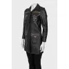 Leather jacket decorated with rivets and crystals