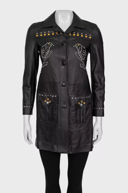 Leather jacket decorated with rivets and crystals