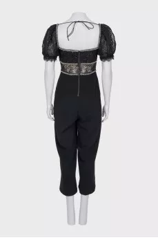 Jumpsuit with openwork sleeves decorated with crystals