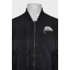 Men's black bomber jacket with buttons