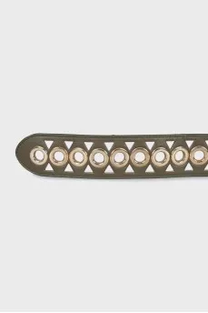 Leather belt decorated with eyelets