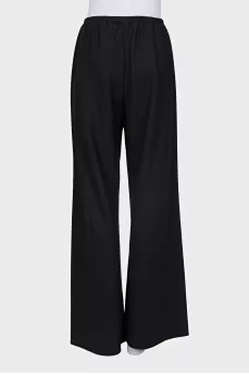 Wide-leg wool trousers with tag