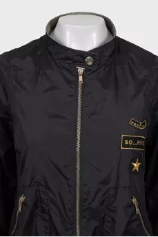 Jacket with a zipper and a patch