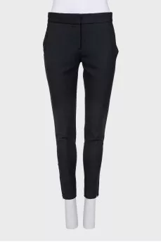 Wool trousers with zippers at the bottom