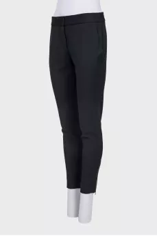 Wool trousers with zippers at the bottom