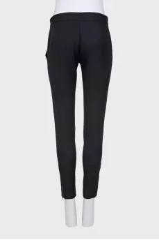 Wool trousers with zippers at the bottom