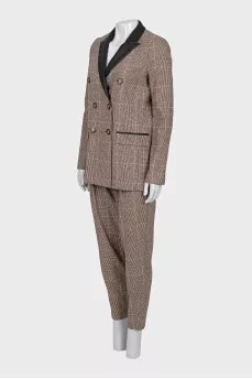 Plaid suit with leather inserts