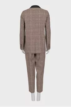 Plaid suit with leather inserts