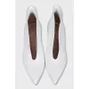 Open white ankle boots