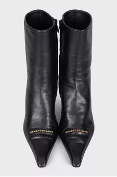 Black leather ankle boots with heels