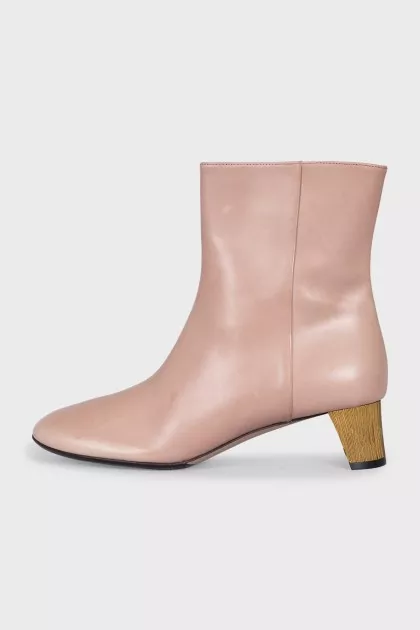 Leather ankle boots with gold heels