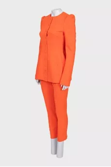 Orange jacket and trousers suit with tag