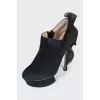 Ankle boots with voluminous decor