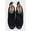 Ankle boots with voluminous decor