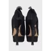 Ankle boots with voluminous decor