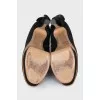 Ankle boots with voluminous decor