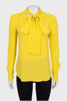 Yellow blouse with ties