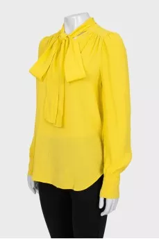 Yellow blouse with ties