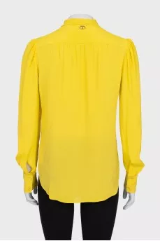 Yellow blouse with ties