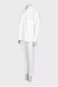 White denim suit with tag