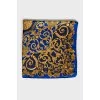 Blue scarf with yellow print