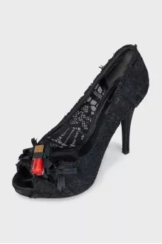 Black shoes decorated with lace