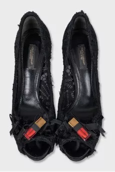Black shoes decorated with lace