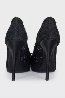 Black shoes decorated with lace