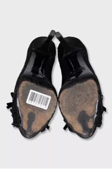 Black shoes decorated with lace