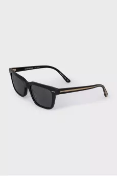 Black glasses with gold temples