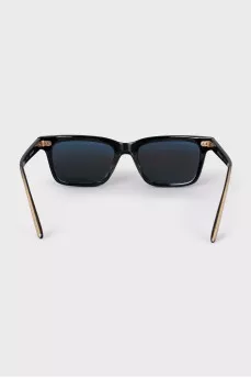 Black glasses with gold temples