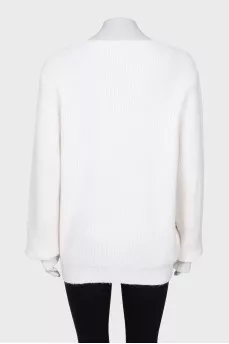 White cardigan with asymmetrical fastening