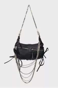 Leather bag decorated with chains and crystals
