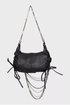 Leather bag decorated with chains and crystals