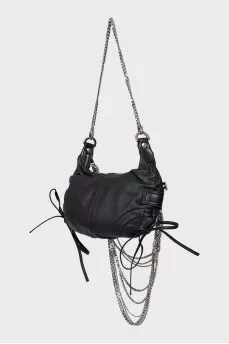 Leather bag decorated with chains and crystals