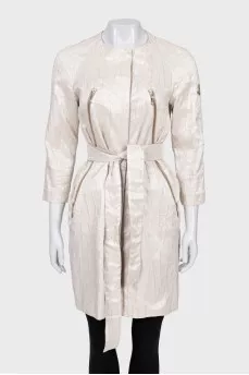 Coat with buttons and belt