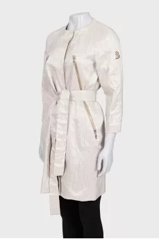 Coat with buttons and belt