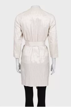 Coat with buttons and belt