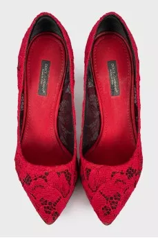 Red lace pumps