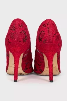Red lace pumps
