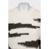 Knitted white sweater