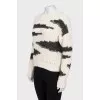 Knitted white sweater
