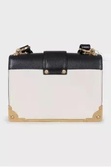 Leather and metal crossbody bag with tag