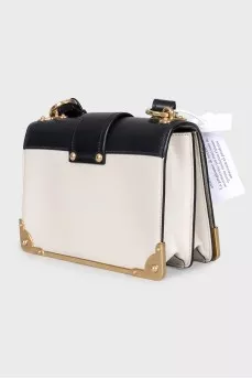 Leather and metal crossbody bag with tag